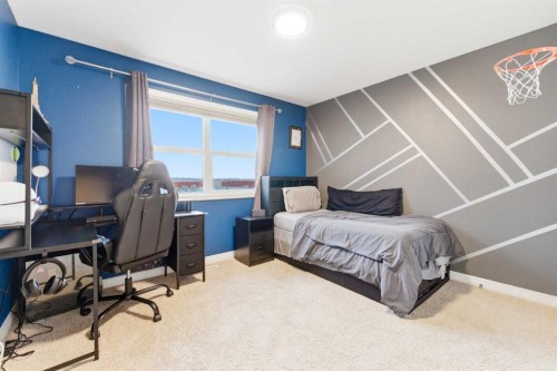 71 Evansfield Rise Nw, Calgary, AB - Indoor Photo Showing Bedroom