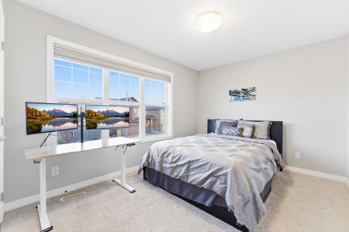 71 Evansfield Rise Nw, Calgary, AB - Indoor Photo Showing Bedroom