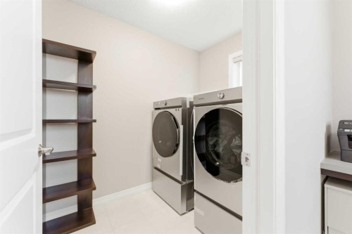 71 Evansfield Rise Nw, Calgary, AB - Indoor Photo Showing Laundry Room