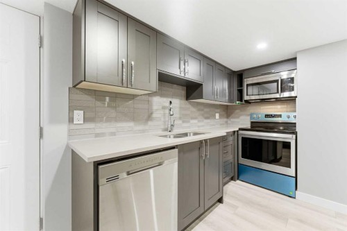 71 Evansfield Rise Nw, Calgary, AB - Indoor Photo Showing Kitchen With Double Sink