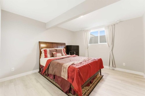71 Evansfield Rise Nw, Calgary, AB - Indoor Photo Showing Bedroom
