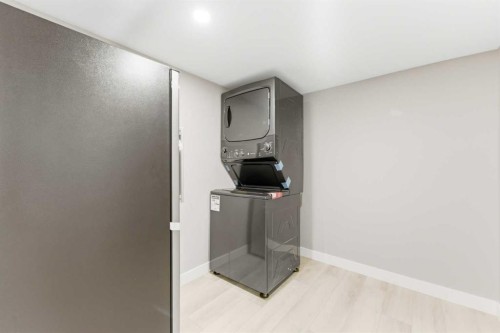 71 Evansfield Rise Nw, Calgary, AB - Indoor Photo Showing Laundry Room