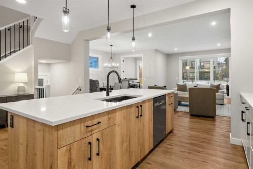 135 Silver Spruce Grove Sw, Calgary, AB - Indoor Photo Showing Kitchen With Upgraded Kitchen