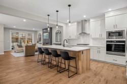 135 Silver Spruce Grove SW Calgary, AB T2X 5M1