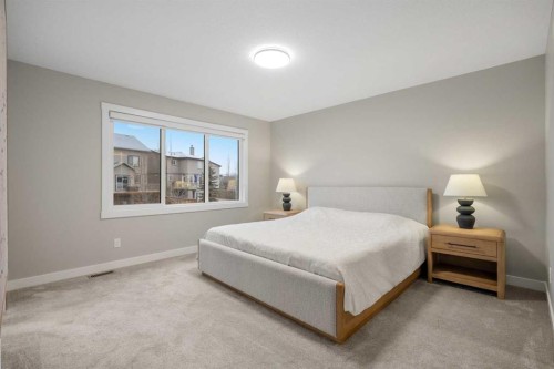 135 Silver Spruce Grove Sw, Calgary, AB - Indoor Photo Showing Bedroom