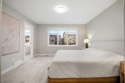 135 Silver Spruce Grove Sw, Calgary, AB - Indoor Photo Showing Bedroom