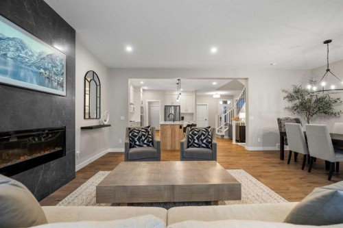 135 Silver Spruce Grove Sw, Calgary, AB - Indoor With Fireplace