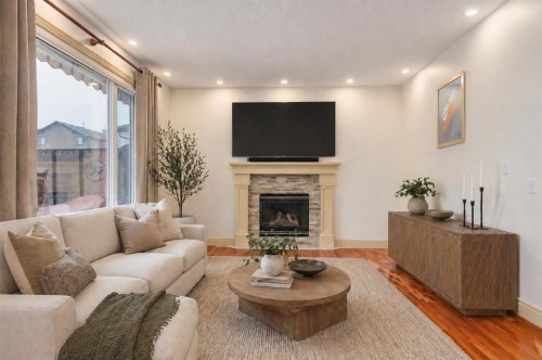 401 Marina Drive, Chestermere, AB - Indoor Photo Showing Living Room With Fireplace