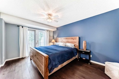 19 Sunlake Gardens Se, Calgary, AB - Indoor Photo Showing Bedroom