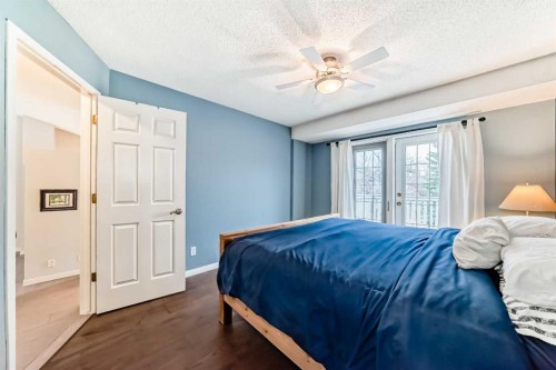 19 Sunlake Gardens Se, Calgary, AB - Indoor Photo Showing Bedroom