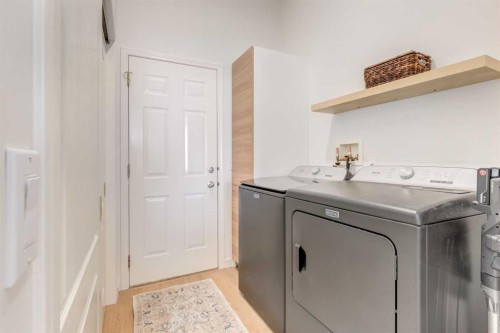 402 Rocky Ridge Cove Nw, Calgary, AB - Indoor Photo Showing Laundry Room
