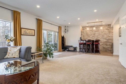402 Rocky Ridge Cove Nw, Calgary, AB - Indoor Photo Showing Living Room