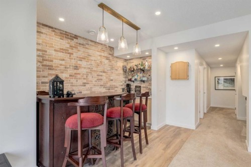 402 Rocky Ridge Cove Nw, Calgary, AB - Indoor Photo Showing Dining Room