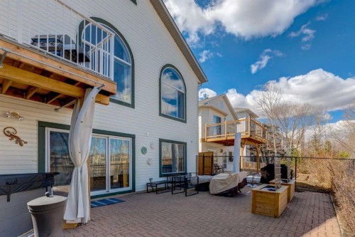 402 Rocky Ridge Cove Nw, Calgary, AB - Outdoor With Deck Patio Veranda With Exterior