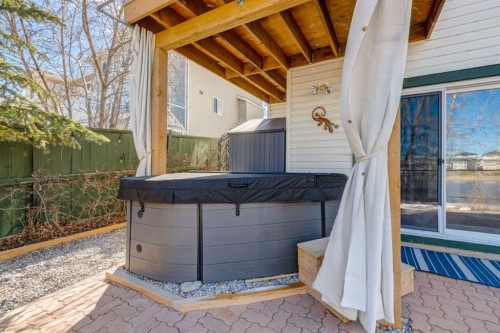 402 Rocky Ridge Cove Nw, Calgary, AB - Outdoor With Exterior
