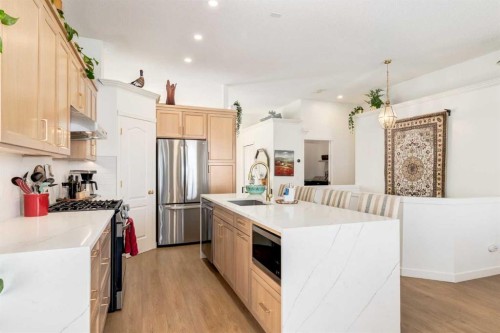 402 Rocky Ridge Cove Nw, Calgary, AB - Indoor Photo Showing Kitchen With Upgraded Kitchen