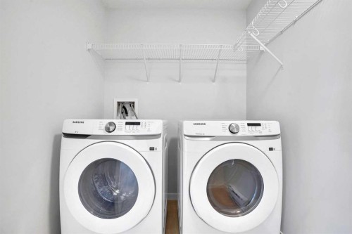 1102-33 Carringham Gate Nw, Calgary, AB - Indoor Photo Showing Laundry Room