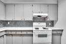 52 Pennsburg Way Se, Calgary, AB  - Indoor Photo Showing Kitchen 