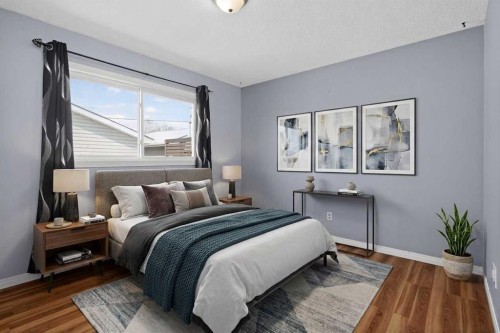 727 Macleay Road Ne, Calgary, AB - Indoor Photo Showing Bedroom