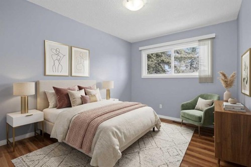 727 Macleay Road Ne, Calgary, AB - Indoor Photo Showing Bedroom