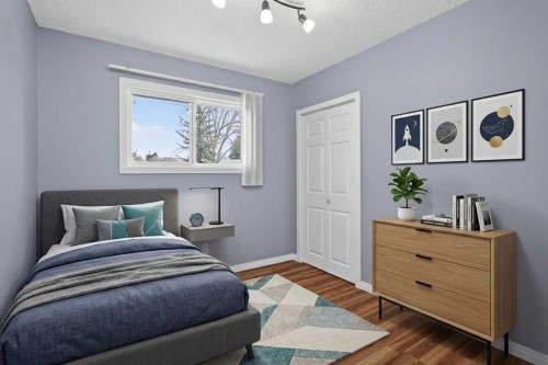 727 Macleay Road Ne, Calgary, AB - Indoor Photo Showing Bedroom