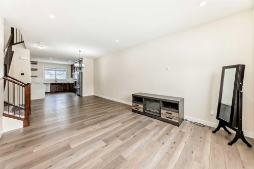 538 Sage Hill Road Nw, Calgary, AB - Indoor Photo Showing Living Room With Fireplace
