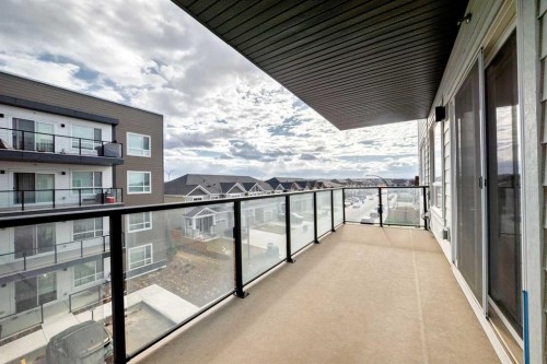 1303-33 Carringham Gate Nw, Calgary, AB - Outdoor With Balcony With Exterior