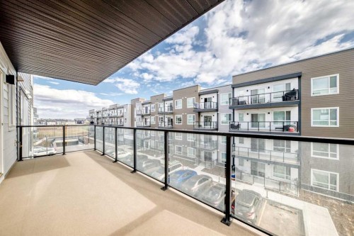 1303-33 Carringham Gate Nw, Calgary, AB - Outdoor With Balcony With Exterior