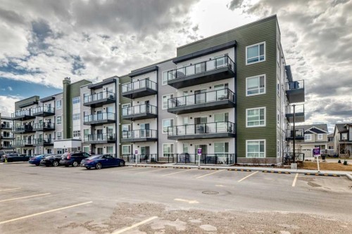 1303-33 Carringham Gate Nw, Calgary, AB - Outdoor With Balcony With Facade