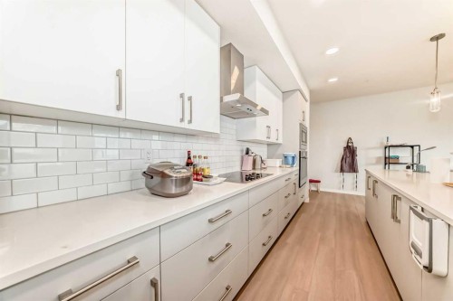 1303-33 Carringham Gate Nw, Calgary, AB - Indoor Photo Showing Kitchen With Upgraded Kitchen