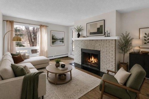 6-3402 Parkdale Boulevard Nw, Calgary, AB - Indoor Photo Showing Living Room With Fireplace