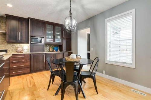 16 Prestwick Road Se, Calgary, AB - Indoor Photo Showing Dining Room