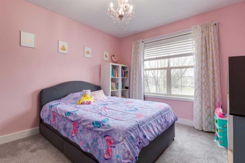 16 Prestwick Road Se, Calgary, AB - Indoor Photo Showing Bedroom