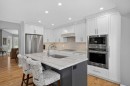 3513 Douglas Woods Heights Se, Calgary, AB  - Indoor Photo Showing Kitchen With Stainless Steel Kitchen With Upgraded Kitchen 
