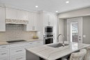 3513 Douglas Woods Heights Se, Calgary, AB  - Indoor Photo Showing Kitchen With Upgraded Kitchen 