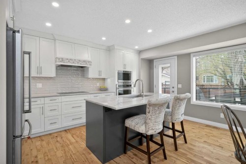 3513 Douglas Woods Heights Se, Calgary, AB - Indoor Photo Showing Kitchen With Upgraded Kitchen