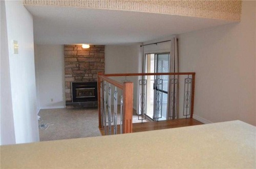 3711 Beaver Road Nw, Calgary, AB - Indoor Photo Showing Other Room With Fireplace
