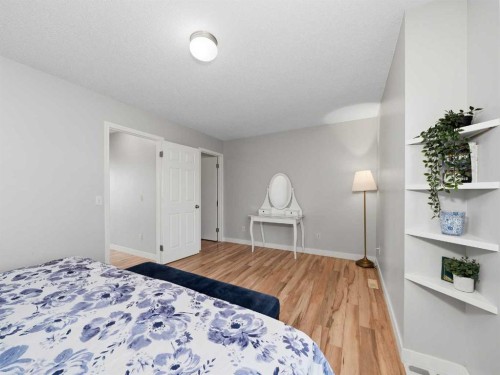 101 Everstone Place Sw, Calgary, AB - Indoor Photo Showing Bedroom