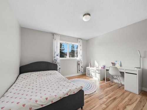 101 Everstone Place Sw, Calgary, AB - Indoor Photo Showing Bedroom