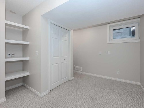 172 Simcoe Place Sw, Calgary, AB - Indoor Photo Showing Other Room