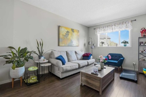 227 Copperpond Row Se, Calgary, AB - Indoor Photo Showing Living Room
