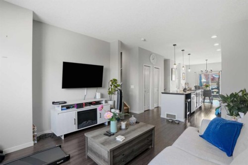 227 Copperpond Row Se, Calgary, AB - Indoor Photo Showing Living Room