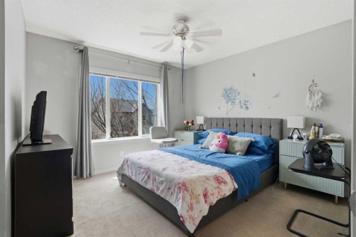 227 Copperpond Row Se, Calgary, AB - Indoor Photo Showing Bedroom