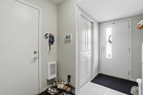 227 Copperpond Row Se, Calgary, AB - Indoor Photo Showing Other Room