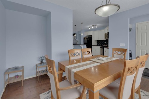 273 Eversyde Boulevard Sw, Calgary, AB - Indoor Photo Showing Dining Room