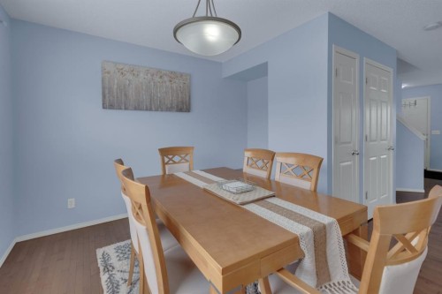 273 Eversyde Boulevard Sw, Calgary, AB - Indoor Photo Showing Dining Room