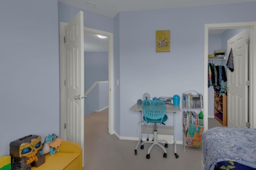 273 Eversyde Boulevard Sw, Calgary, AB - Indoor Photo Showing Bedroom