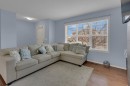 273 Eversyde Boulevard Sw, Calgary, AB  - Indoor Photo Showing Living Room 