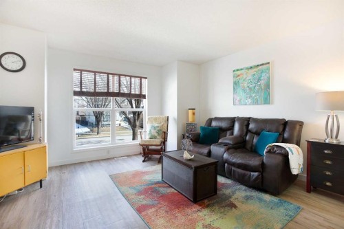 211 Prestwick Heights Se, Calgary, AB - Indoor Photo Showing Living Room