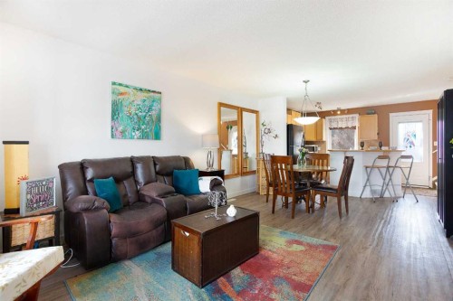 211 Prestwick Heights Se, Calgary, AB - Indoor Photo Showing Living Room